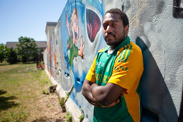 WallTherapy founder Dr. Ian Wilson at the Troup Street mural where the seeds of the annual festival were planted in 2011. - FILE PHOTO