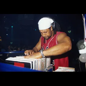 DJ Kool Herc, looking through his records, DJing, Blackpool, UK 07.10.2000
