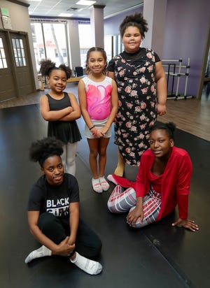 Dancers from the Street Elite Dance Academy pose from left, Mizz Bre, Symiya Tuck,7, A'leah Daniel, 9, Amamri Williams,9, and Keemya Crump, 17, Saturday, February 17, 2024, in Sheboygan, Wis.