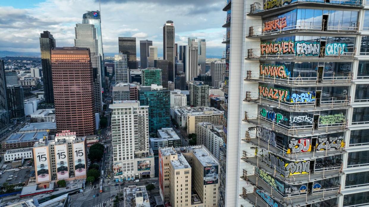 Taggers have graffitied what appears to be more than 25 stories of a downtown Los Angeles skyscraper