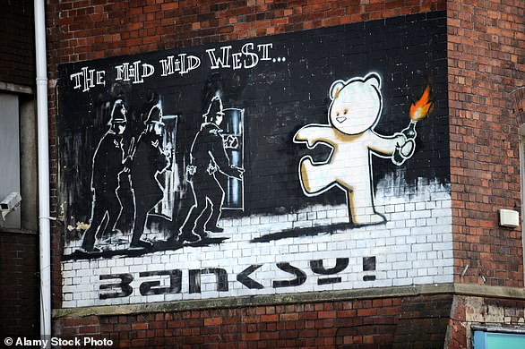 The identity of Banksy is one of the most closely guarded secrets in the world, but that hasn't stopped people from speculating. Above: Banksy's The Mild Mild West. The large mural was painted in 1999 in Bristol's Stokes Croft and shows a teddy bear throwing a Molotov cocktail at three riot police