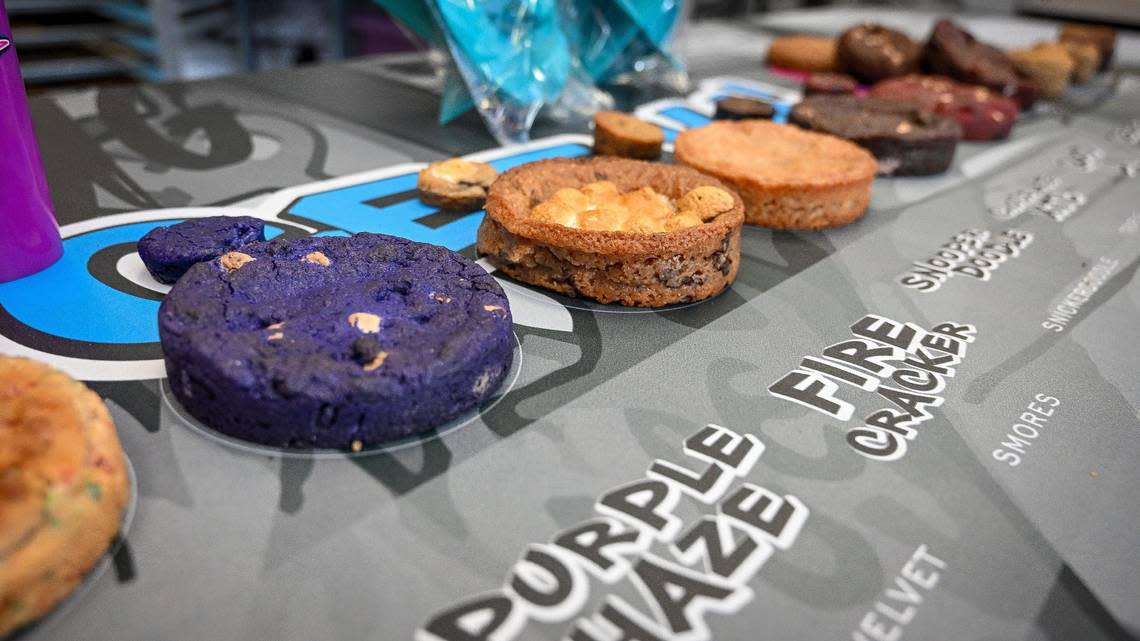 Cookies and their names are laid out at Cookie Plug during its soft opening and ribbon-cutting event in Fresno State’s Campus Pointe shopping center on Thursday. Its grand opening is this weekend.