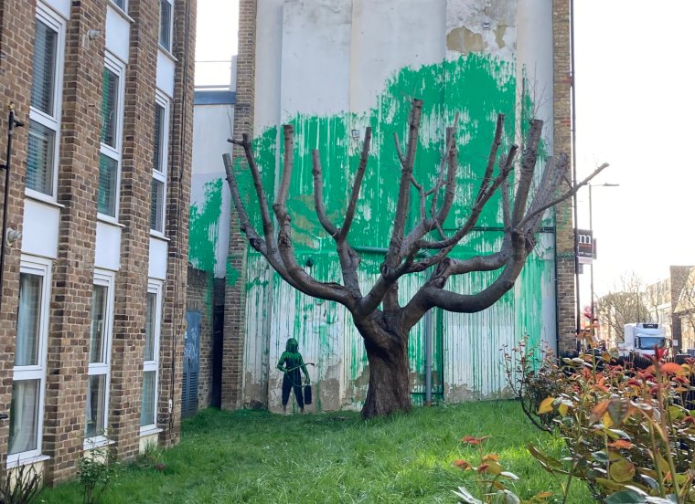 A new piece of art work, which has appeared on the side of a building on Hornsey Road in Finsbury Park, London, is suspected of being by street artist Banksy. Picture date: Monday March 18, 2024. PA Photo. See PA story ARTS Banksy. Photo credit should read: Ella Nunn/PA Wire