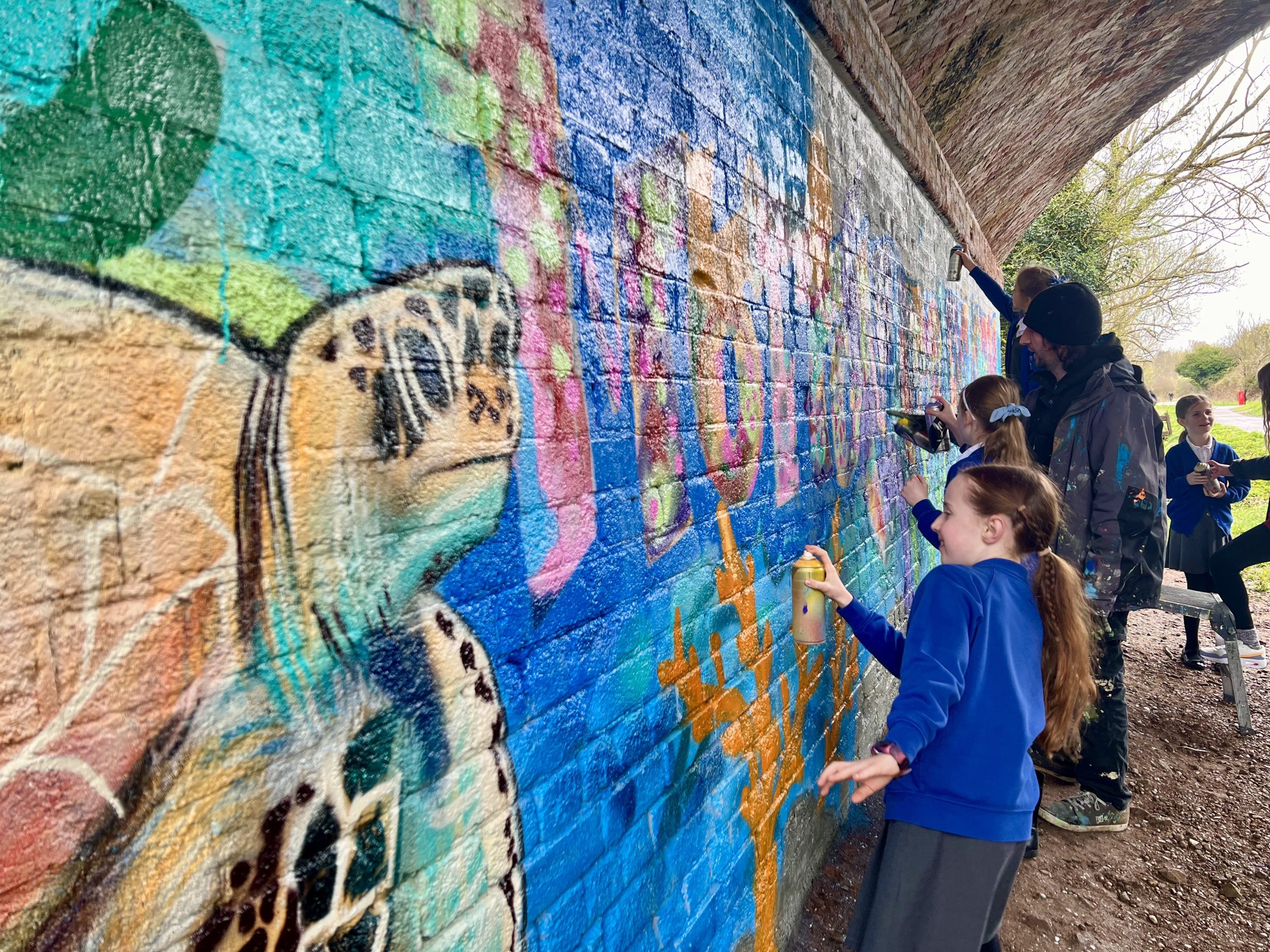 Barnby Road Academy Year 4 pupils painting the Motion to the Ocean artwork 5 scaled