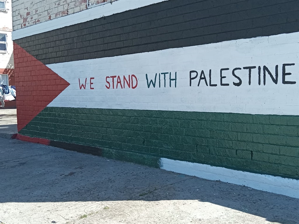 Earlier this year, Ebrahim Freeman, 60, of Lavender Hill in Cape Town, made headlines when he painted a Palestine flag mural on the outside wall of Wicht Court. (Ebrahiem Freeman/Supplied)
