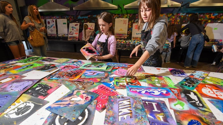 Ryleigh Spark, 7, of Manorville, and her cousin, Julia Mars, 8,...