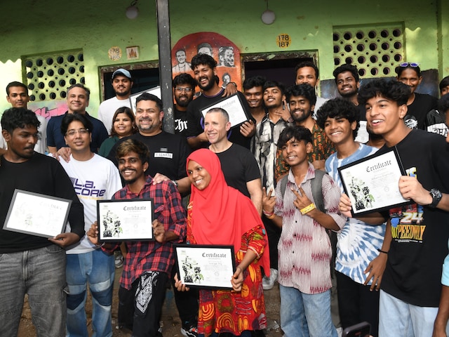 Executive from Global Music powerhouse commits to community empowerment in Dharavi.