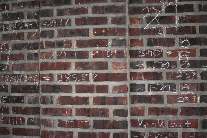 Apparently, some poor kid in Haddonfield lacked a notebook, so he did his equations on the wall of the borough's high school.