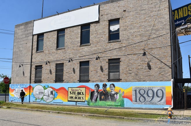 A new mural celebrating East Camden now extends down the 17th Street side of the former Bush Refrigeration Building on Admiral Wilson Boulevard. The date, 1899, refers to the year Stockton Township was annexed by Camden.