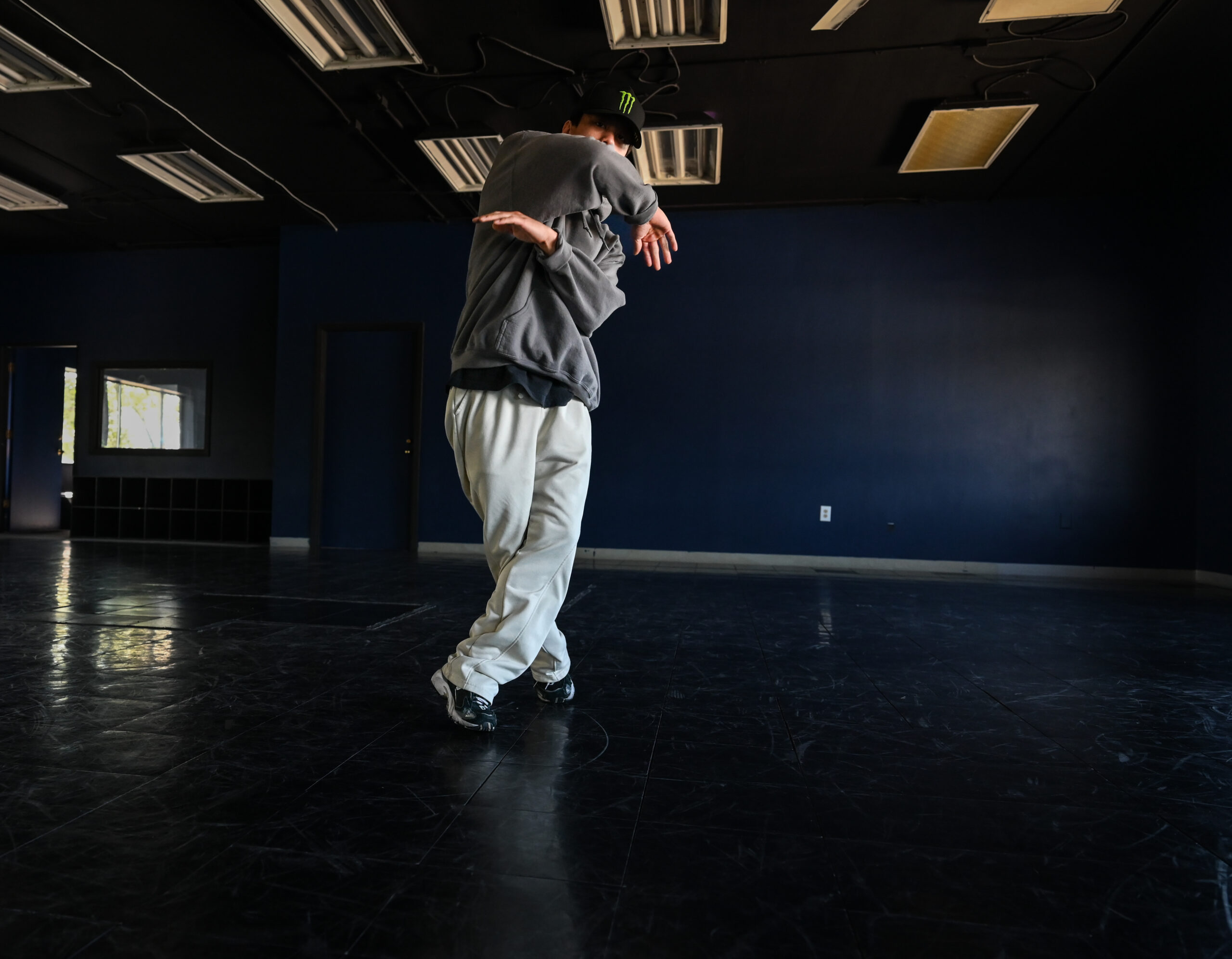 A break dancer practicing moves.