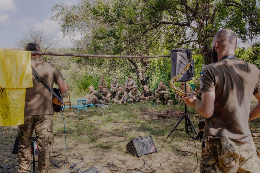 A band of soldiers plays a concert for soldiers near the front lines in eastern Ukraine’s Donbas region.