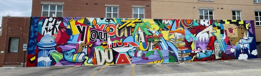 This mural by Jordan Nickel, artist name POSE, is at 828 Noyes St. under the Purple Line L station in Evanston.