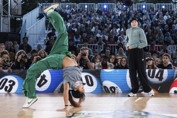 FILE - Logan Edra of the United States, known as B-Girl Logistx, competes during the World Breaking Championships in Leuven, Belgium, Sunday, Sept 24, 2023. (AP Photo/Geert Vanden Wijngaert, File)