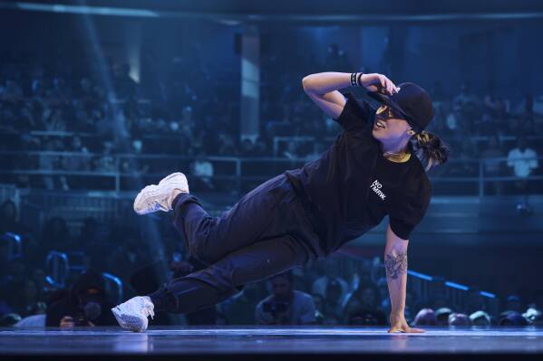 FILE - Sunny Choi, also known as B-Girl Sunny, from the United States, competes in the B-girl Red Bull BC One World Final at Hammerstein Ballroom, Saturday, Nov. 12, 2022, in New York. Team USA breakers are not just focused on nailing their moves, they’re serving as ambassadors of the birthplace of a culture and lifestyle now deemed an Olympic sport. (AP Photo/Andres Kudacki, File)