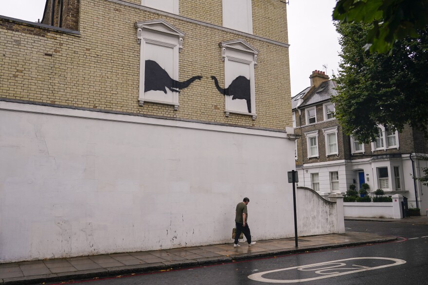 An artwork by the street artist Banksy that appeared in west London, Tuesday, Aug. 6, 2024.