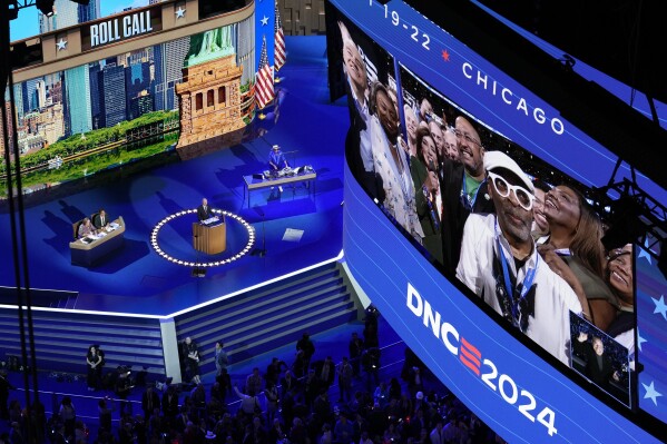 Spike Lee watches as New York Gov. Kathy Hochul casts their vote for Democratic presidential nominee Vice President Kamala Harris during the Democratic National Convention Tuesday, Aug. 20, 2024, in Chicago. (AP Photo/Morry Gash)