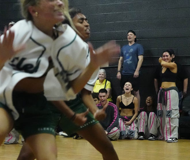 Members of Legendz cheer on Elektro Crew as they dance during a performance for friends and family as the team practices for the Hip Hop International's World Hip Hop Dance Championship Aug. 1, 2024 in Mesa, Arizona.