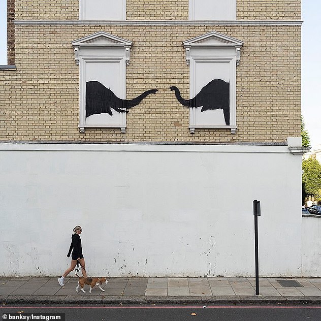 Banksy has unveiled another new artwork in Chelsea depicting two elephants poking their heads out of blocked out windows - his second piece to appear in London in less than 24 hours