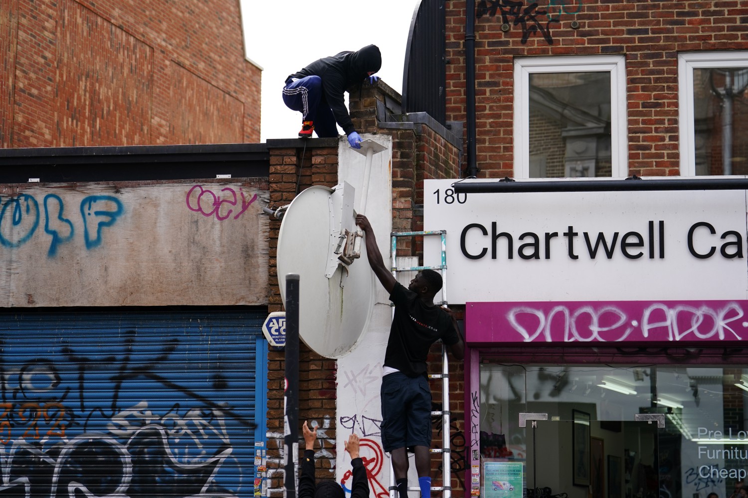 Two men were caught stealing the satellite