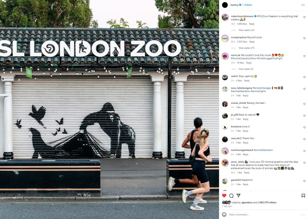 A screenshot of Banksy's London Zoo graffiti taken from Instagram, with comments from followers shown on the right hand side