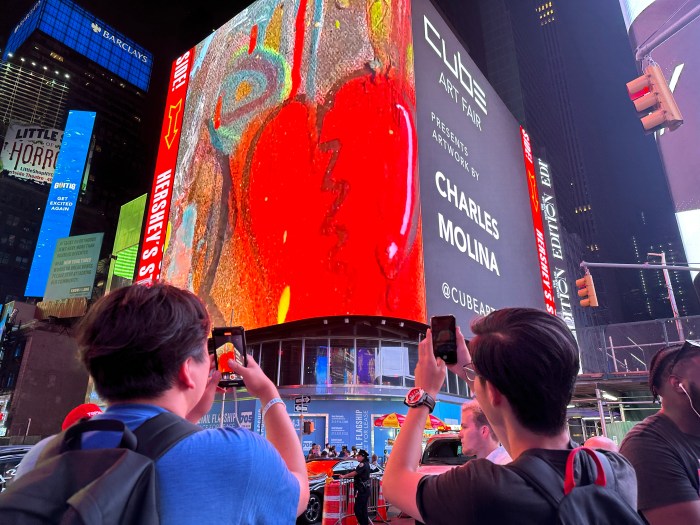 art display in Times Square at night