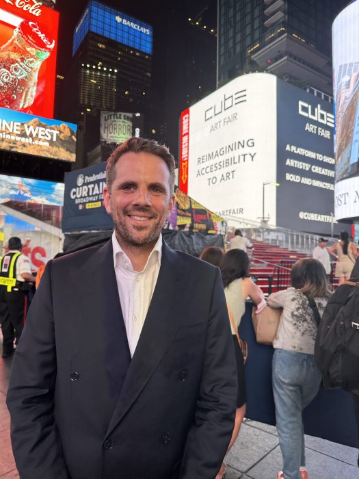 man standing in Times Square