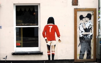 Banksy graffiti on the wall of the Prince Albert Pub in Brighton