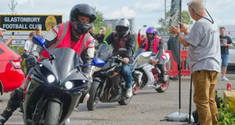 Will Baldman Photography Lots of motorbikes gathered exiting a gravel car park