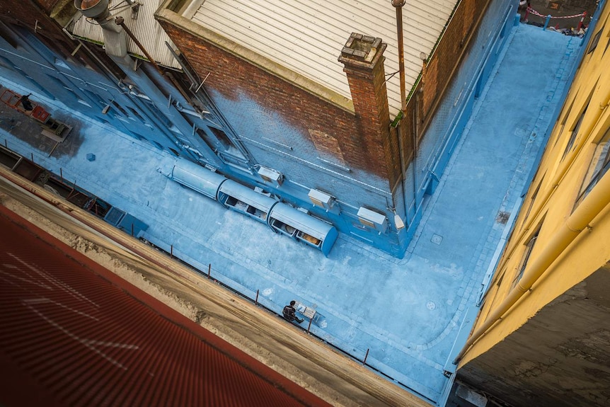 Rutledge Lane after being painted blue