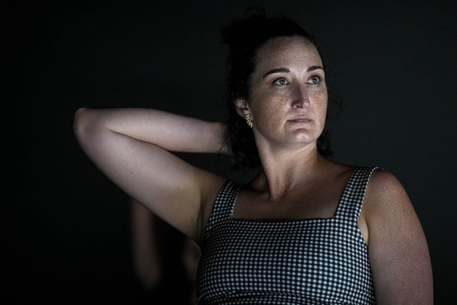 Shelby Hadden looks into a wall of mirrors while warming up for the Hip Hop Groovers of Austin dance class at Ballet Austin’s Butler Center of Dance and Fitness on Monday, Sept. 9, 2024.