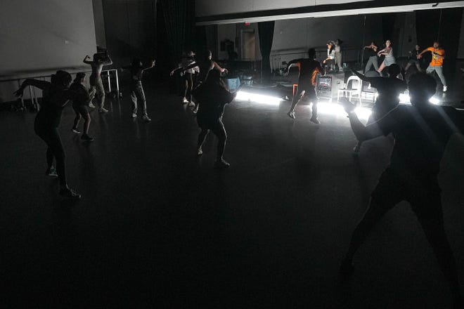 About a dozen students dance during the Hip Hop Groovers of Austin dance class at Ballet Austin’s Butler Center of Dance and Fitness on Monday, Sept. 9, 2024.