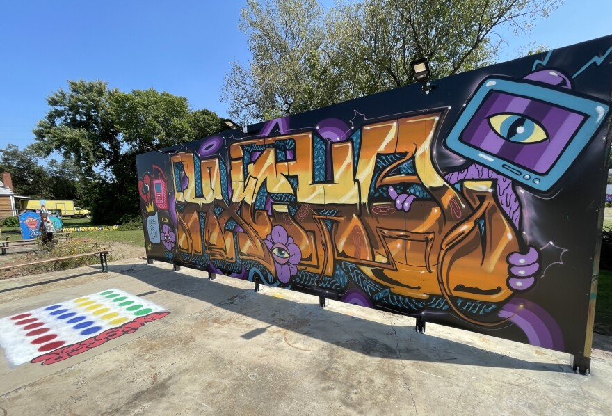 A classic game of Twister has been painted on the concrete by artists Jawn Doe and HUMZ, beneath a piece by artist Purgatory Help Hotline and Treazy Treaz.