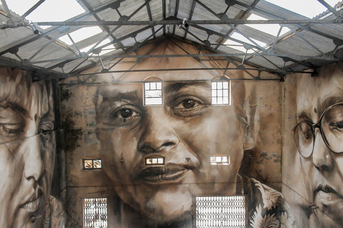 Artist Guido Van Helten spent days photographing local women at the docks. Their vast portraits grace the warehouse where people like them have carried on their traditional business for the 142 years of Sassoon Dock’s existence. The creative lead for this project was Hanif Kureshi