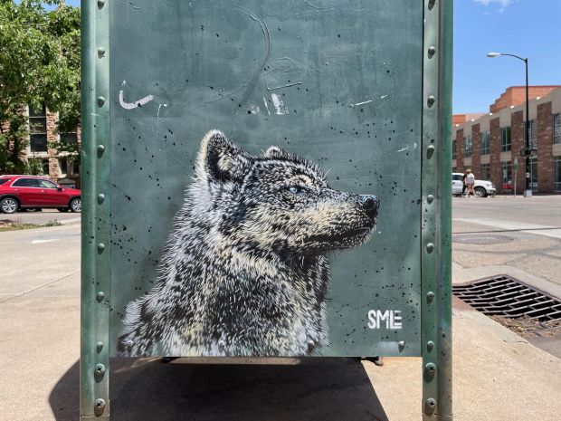 SMiLE's gallant wolf adorns an otherwise overlooked urban fixture in downtown Boulder. (SMiLE/Courtesy photo)