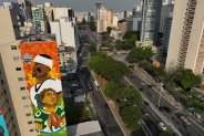 Jalen Hurts and Jordan Love depicted on large mural in São Paulo, Brazil.