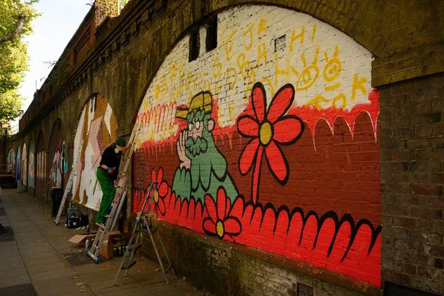 Pictured is: One of the many artworks along the railway arches by the Hard.  Picture: Keith Woodland (140921-102)