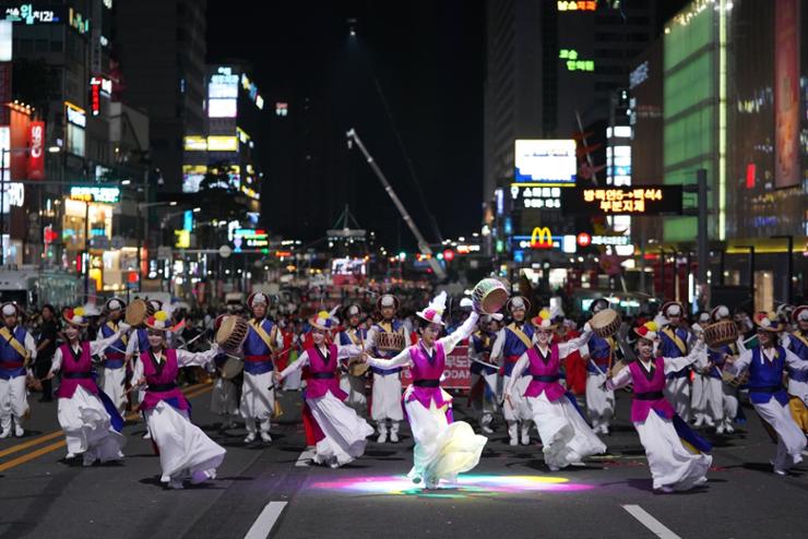 Participants of the Cheonan World Dance Festival 2024 perform during its street parade program in the South Chungcheong Province city, Friday. Courtesy of Cheonan City