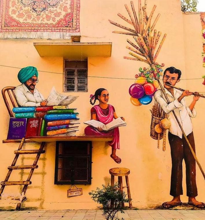 A mural depicting the daily life on the streets of Lodhi painted by Aaron Glasson