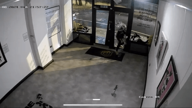 A man was caught on CCTV smashing into Grove Gallery