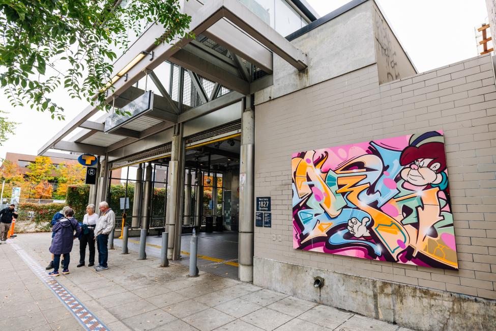 A graffiti art piece by Aerub on the right side of the station entrance in Seattle's Capitol Hill neighborhood