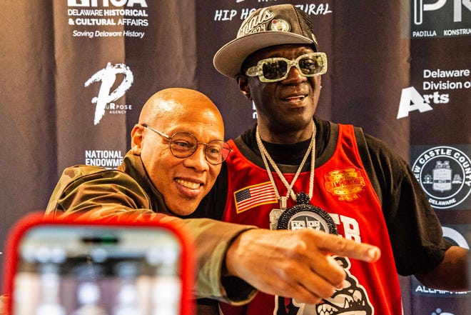 Headliner Flavor Flav takes Hakim Green at the second Hip Hop Cultural Summit at the Delaware Art Museum in Wilmington, Saturday, Oct. 27, 2024.