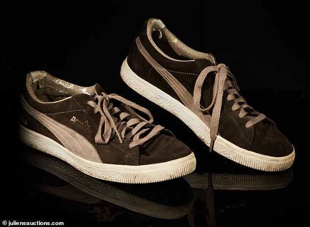 A pair of Banksy's Puma sneakers are among the more than 170 lots at auction in Los Angeles