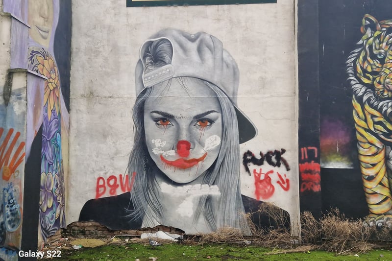 Distinctive image of a young woman, created to the rear of Topping Street, Blackpool