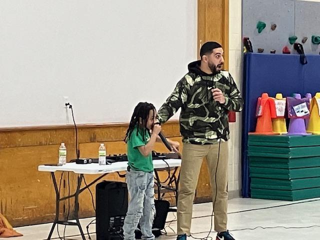 Beatboxer Ahmed Zaghbouni (MR MiC) performed with students at Bowlesburg School in Silvis in February 2024 (photo by Jonathan Turner).