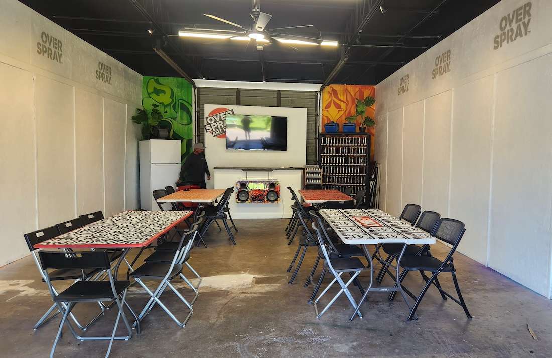 tables for graffiti painting at overspray art space.