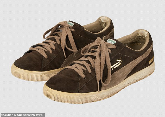 Other items also included an original brand of Puma 'Turf War' sneakers worn by the Bristol artist