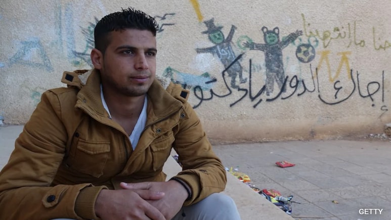 How A Syrian Teen Triggered Al-Assad's Fall With Graffiti 13 Years Ago