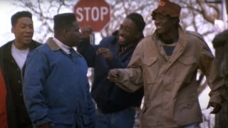 the characters from Juice walking down the street together.