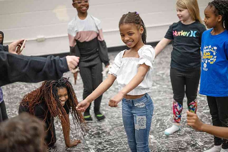 Ariyah Lennox dances as she is hyped up by fellow second-graders during a class with Rooted Movement Collective on Wednesday, Jan. 29, 2025, at Harmony Leadership Academy in Texarkana, Ark. (Staff photo by Stevon Gamble)