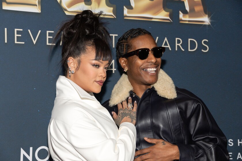 Rihanna and A$AP Rocky attend the Footwear News Achievement Awards in December in New York City.